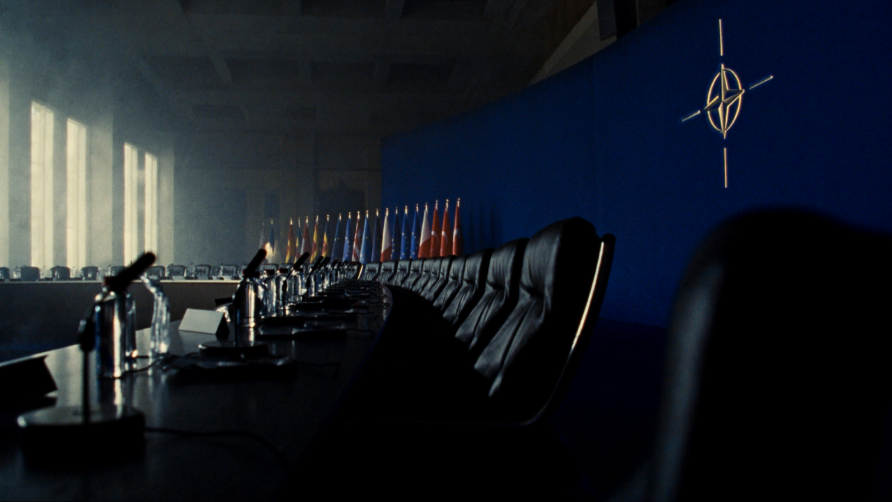 Conference hall with NATO emblem and European flags ahead of the 2026 Ankara summit